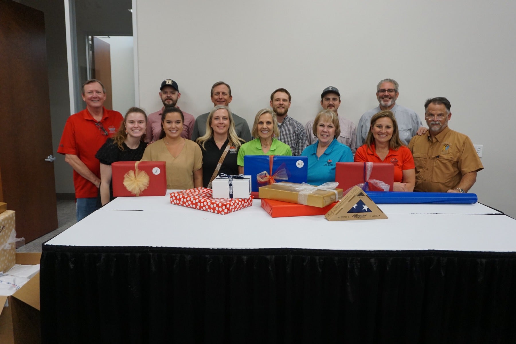 Service volunteers wrapping gifts