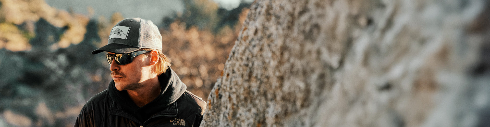 Man wearing the new WX Alpine sunglasses